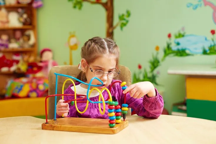 ABA therapist guiding parents for autism support and training in UK home