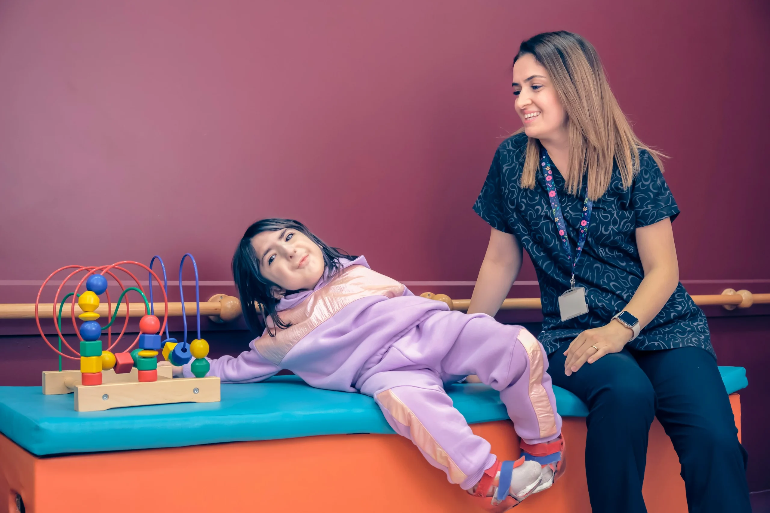 About Us 6 ABA therapist guiding parents for autism support at home UK