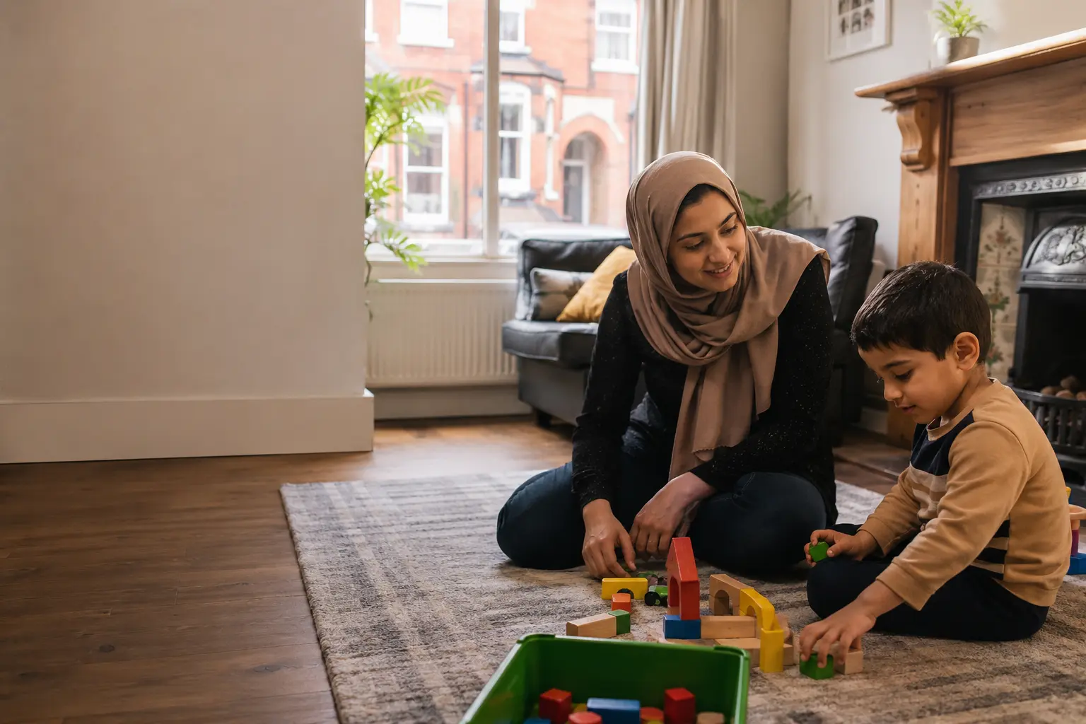 ABA home therapist supporting an autistic child during a home session in Manchester